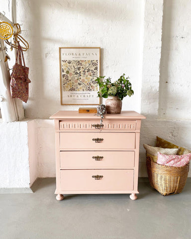 Old pink vintage chest of drawers